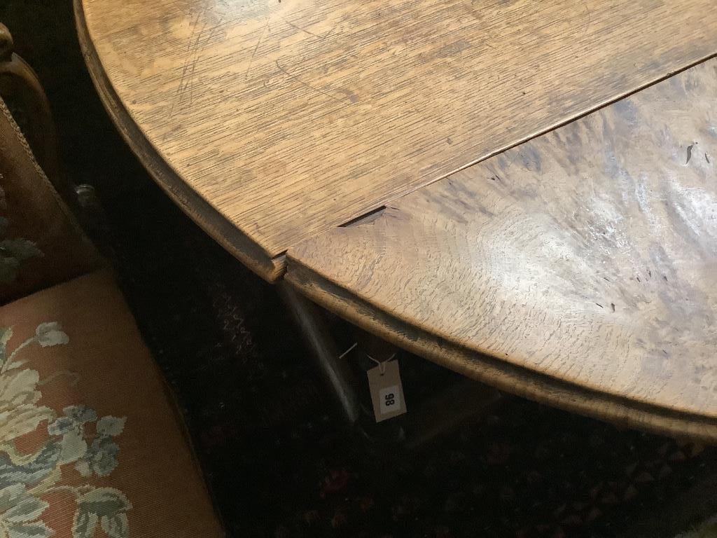 An 18th century oak gateleg table, width 116cm, depth 118cm, height 74cm